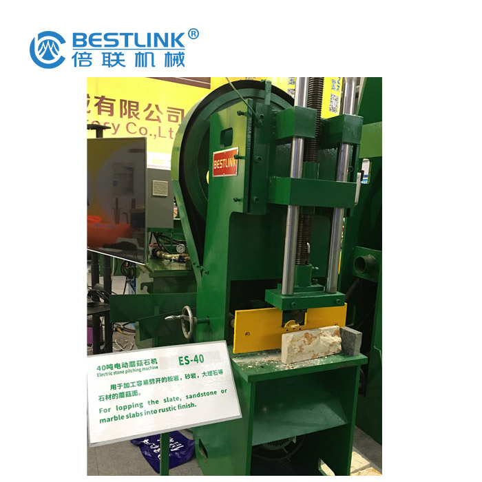 Decorative stone breaking machine (10)
